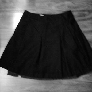 J.G. Hooks black pleaded skirt